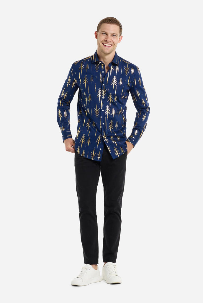 Man wearing dark blue Christmas shirt with golden foil trees