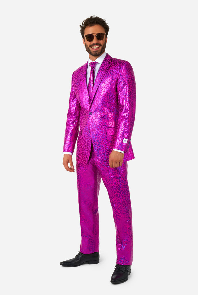 Man wearing shiny pink lizard skin men's suit