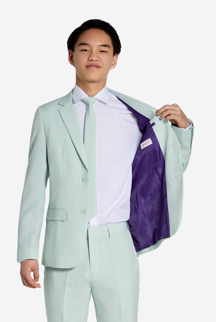 Teen wearing mint green teen boys suit.