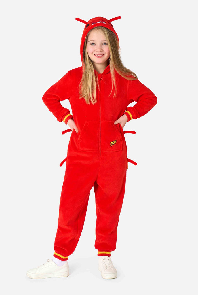 A kid is wearing a bright red lobster-themed kids onesie featuring playful hood details and cozy, soft material. Full body image.