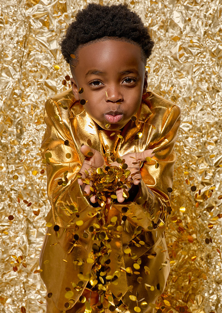 Kid wearing golden suit